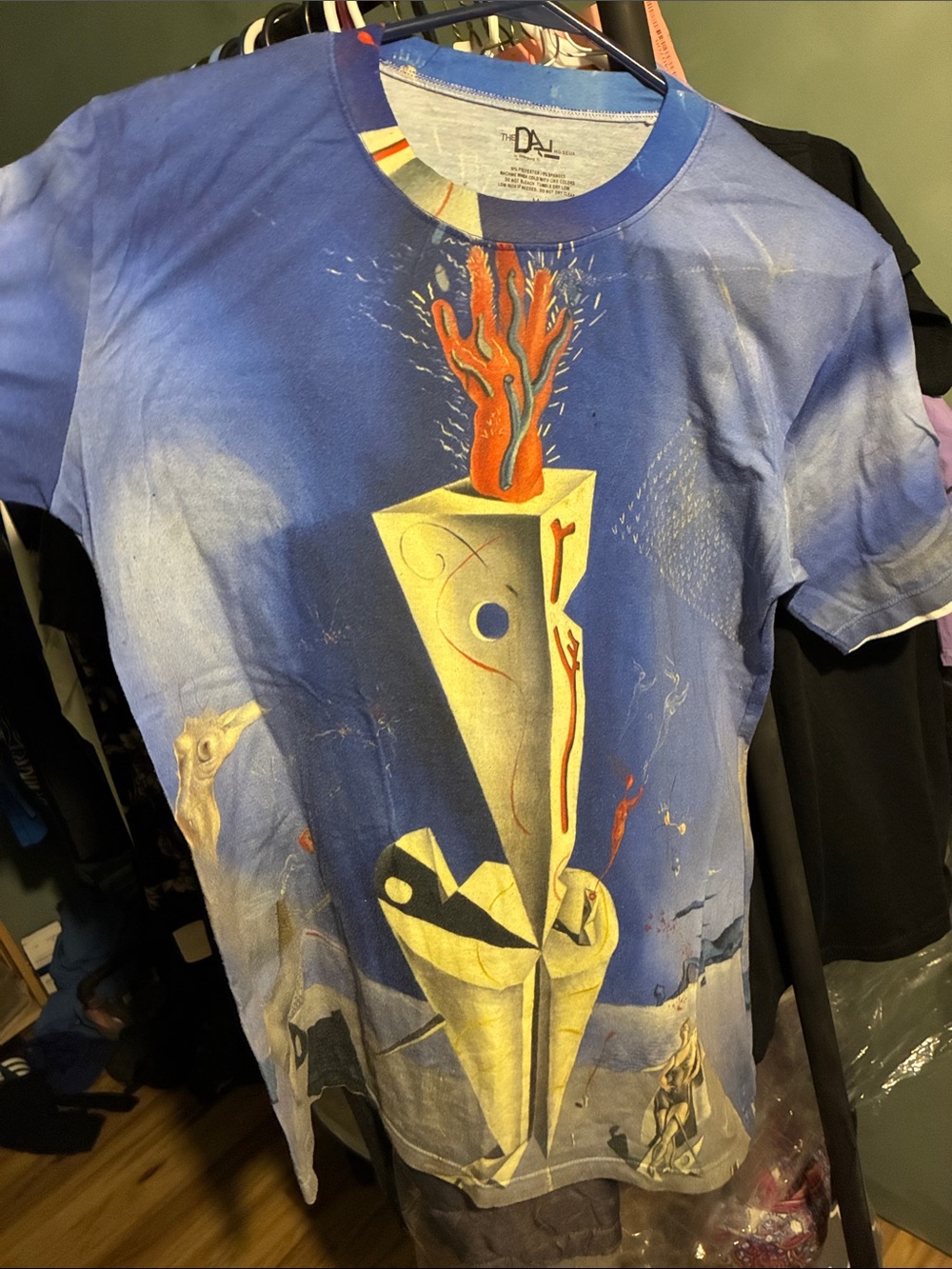 Surreal Blue Graphic Tee with Orange Accent